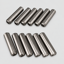 Twelve valve guides on light gray background